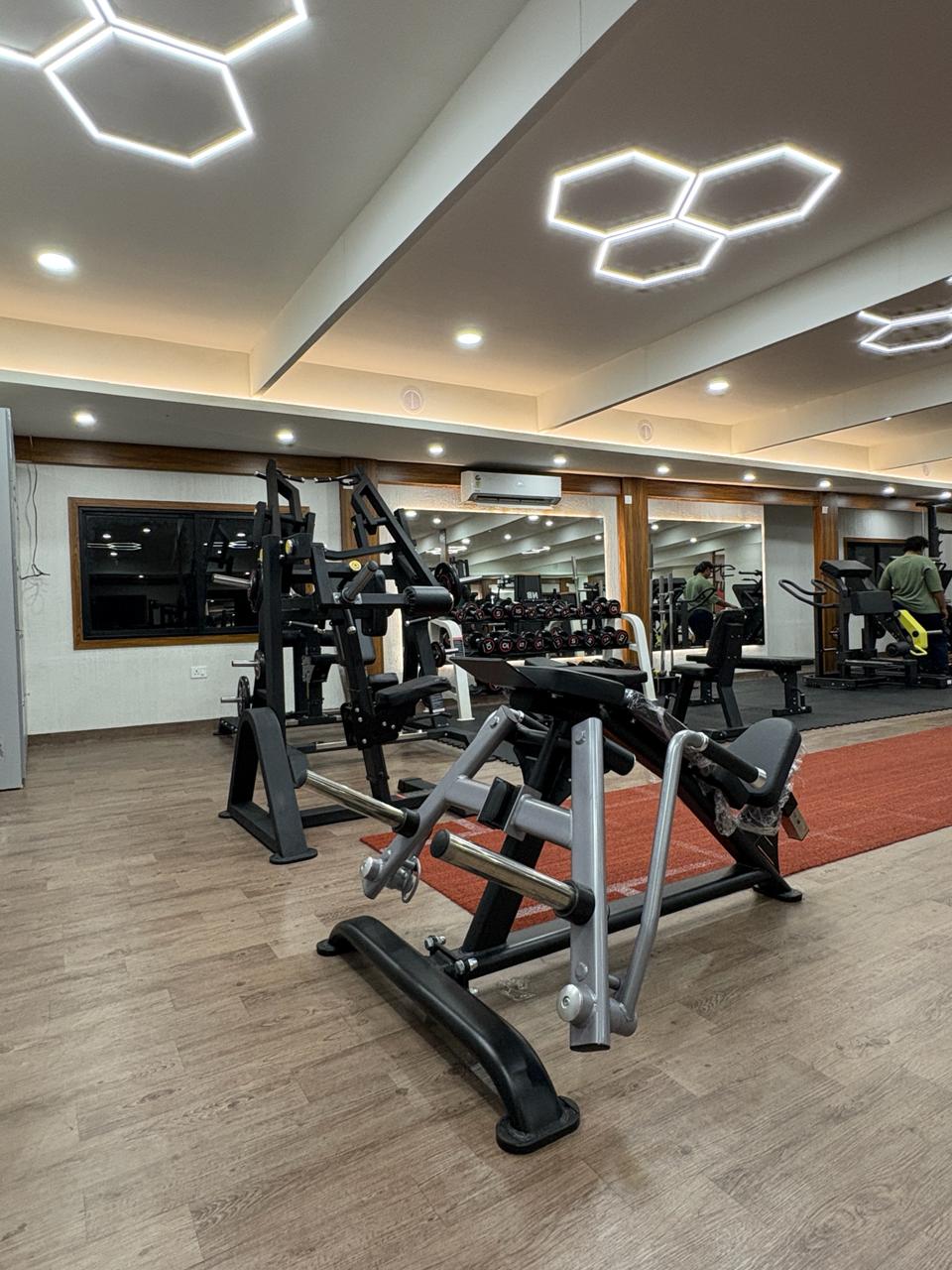 Inside Liger Fitness Vellimadukunnu - training area and premium equipment